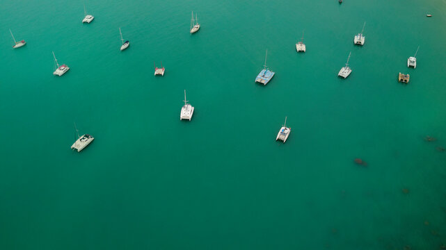 Aerial View of Catamarans Anchored in Turquoise Sea