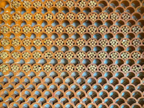 
Decorative Wall Made of Terracotta Bricks Filled with Wine Corks