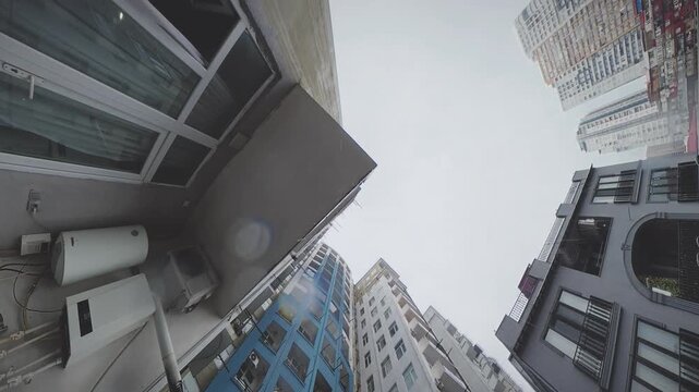 Rainy Urban View of Old and New Apartment Buildings