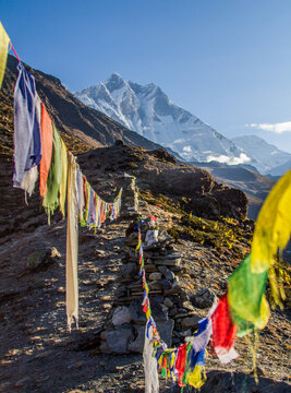 Buddhist Prayer Flags with Snow Mountains Nepal Himalayas