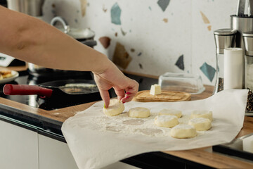 Cooking Ukrainian Syrnyky at Home in a Frying Pan