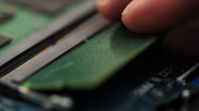 Extracting DDR5 RAM module from motherboard slot