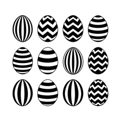 Obraz premium A collection of black and white Easter eggs with various striped and chevron patterns on a plain background