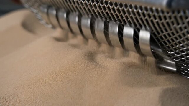 Industrial machine processing fine powder material.