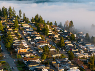 Aerial View Of A Misty Hillside Neighborhood In Burnaby, BC, Canada