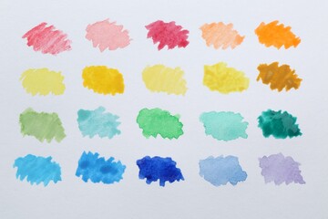 Painted watercolor samples on canvas, top view