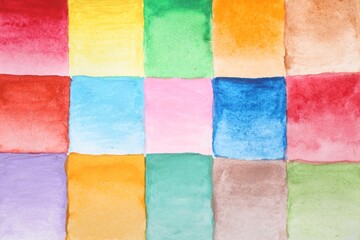 Fototapeta premium Painted watercolor samples as background, top view