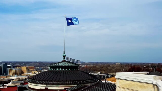 new minnesota flag at roof in saint Paul on a summer day