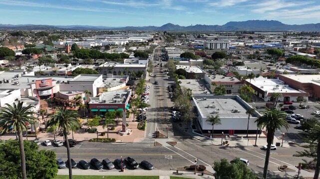 Oxnard, California, USA &ndash; High Aerial View of Plaza Park Gazebo in Downtown Oxnard With Surrounding Residential and Commercial Development and the Topatopa Mountains in the Background