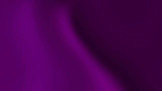 A close-up view of a purple fabric texture with soft folds and gentle creases