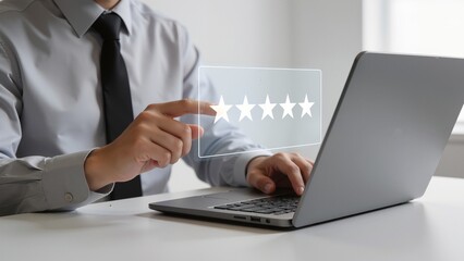 Person giving five star rating on laptop