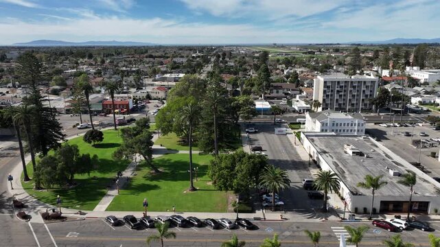 Downtown Oxnard, California, USA &ndash; High Aerial View of Plaza Park and Surrounding Urban Neighborhood With City Streets, Downtown Area, and the Topatopa Mountains in the Background