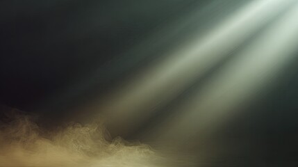 Obraz premium Soft, ethereal light beams radiate through a dark smoky background, creating a mystical and serene atmosphere perfect for creative or artistic projects.