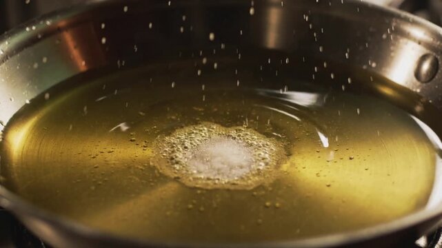 Cooking Oil Heating in Frying Pan Close Up