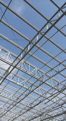 Metal Grid Structure Under Blue Sky.