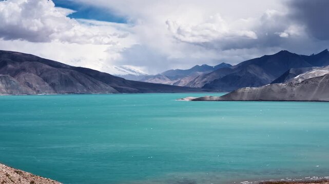 Turquoise Alpine Lake with Snow-Capped Mountains, Xinjiang