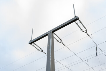 A tall pole with wires on it