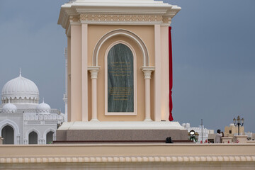 Fototapeta premium Sharjah Independence Monument at Al Ittihad Square, UAE. Iconic landmark symbolizing national identity, heritage, and unity of the United Arab Emirates.
