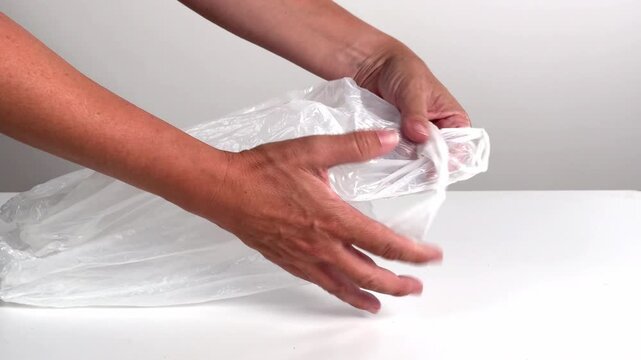 Video with real sound effect of Plastic bag crinkling squeezing