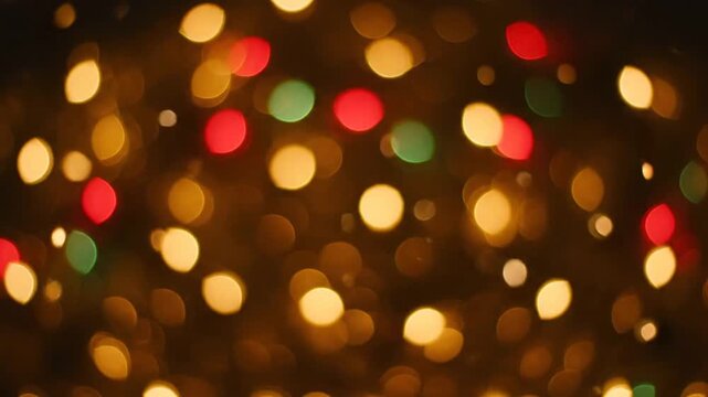 Blurry colorful bokeh lights in a festive atmosphere, captured from a close-up viewpoint in a dark environment like video (621).mp4