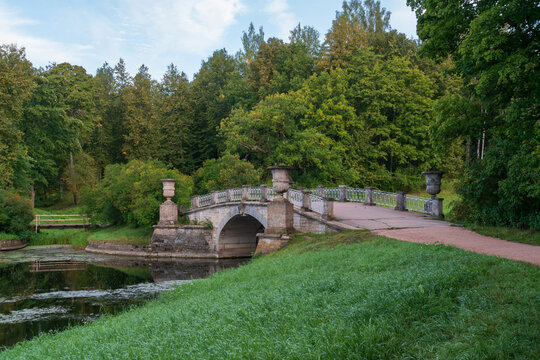 Slavyanka River Valley and the Viscontiev Bridge in the Pavlovsk Palace and Park Complex on a sunny summer day, Pavlovsk, Saint Petersburg, Russia