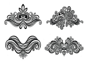 Set of four ornate black and white design elements with swirling patterns