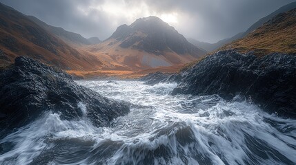 Waves crash into rocky shore with mountain range in the distance