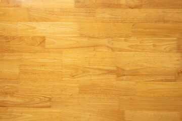 Fototapeta premium Top view of light brown wood texture background with natural parquet pattern