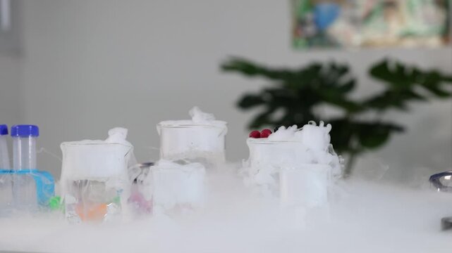 Dry Ice Sublimation Creating Thick White Smoke in Laboratory Glass Beakers