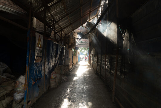 Boracay, Aklan, Philippines - December 12, 2016: A dark ally way created by construction scaffolding in a back ally in Boracay station two, prior to the major rehabilitation on the island