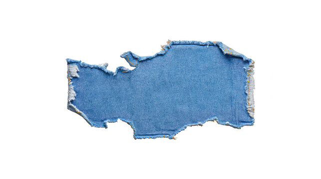 Blue denim scrap with torn edges and texture, isolated on black background for design use