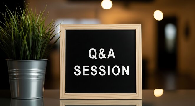 Business q a session concept with chalkboard sign and potted plant
