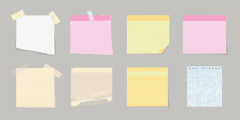 Collection of colorful sticky notes and paper scraps on a gray background