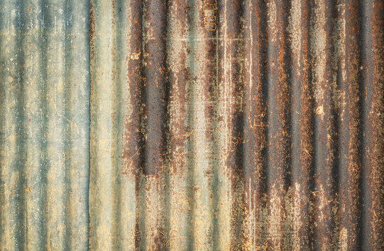 Old zinc vintage fence wall texture for background, pattern of rusty on metal panel.