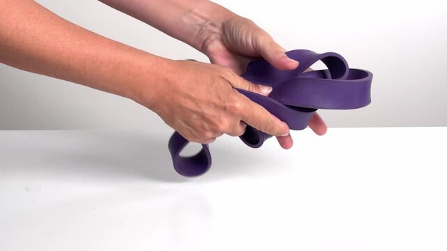 Video with real sound effect of Rubber band stretching squeezing