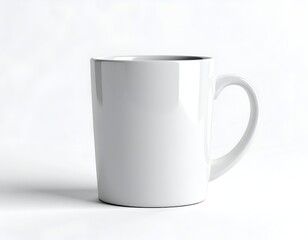 Obraz premium A bright white ceramic mug stands alone, casting a soft shadow on a clean white background