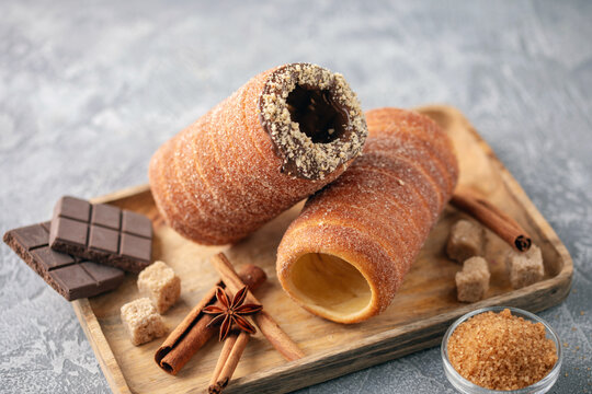 Czech trdelnik or Hungarian kurtosh kalach. Roasted pastries with sugar and cinnamon