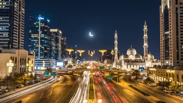 Spectacular night view of Sheikh Zayed Grand Mosque Road with illuminated city