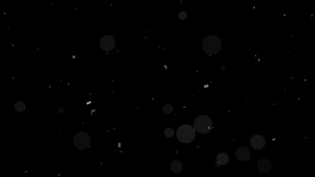 Abstract atmospheric dust particles slowly moving upwards with gentle bokeh light movement on black background