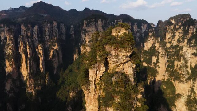 Towering Quartz-sandstone Pillars Within The Zhangjiajie National Forest Park In Hunan Province, China. - aerial shot