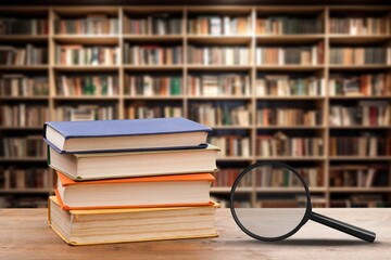 Old books and magnifying glass, history, education concept