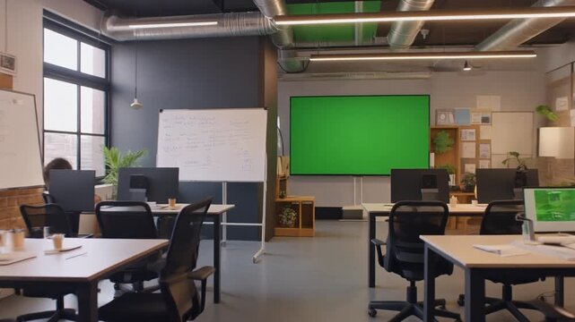classroom in school with green screen on the wall