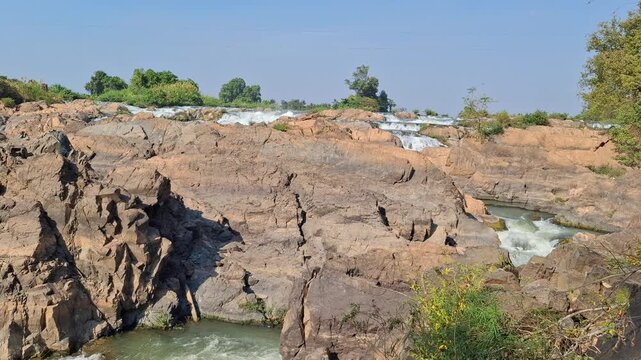 Li Phi (also known as Tad Somphamit) is a massive, rocky waterfall located on Don Khon island within the Si Phan Don (4,000 Islands) archipelago in southern Laos. It is famous for its powerful