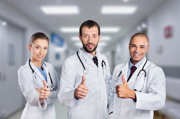 Portrait of a happy successful team of doctors in uniform