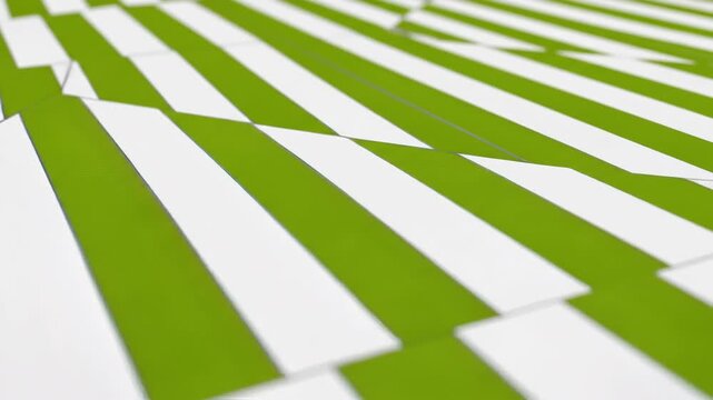 Abstract green and white parallel stripes pattern animated background