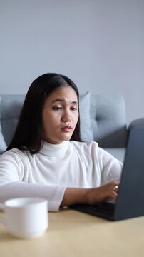 Asian Woman feeling tired and yawning, battles fatigue and boredom