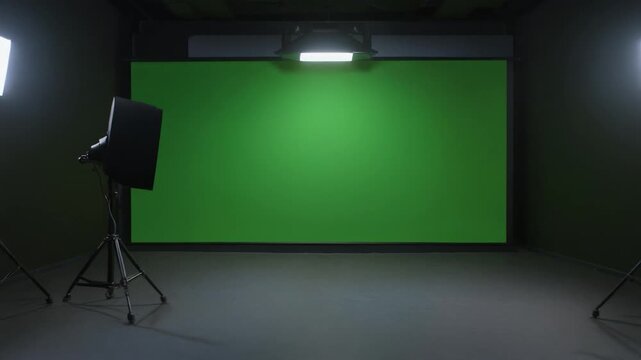 studio shot of a projector screen with green screen on the wall