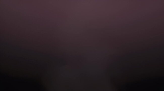 Abstract gradient with soft transitions between violet, plum and dark shades