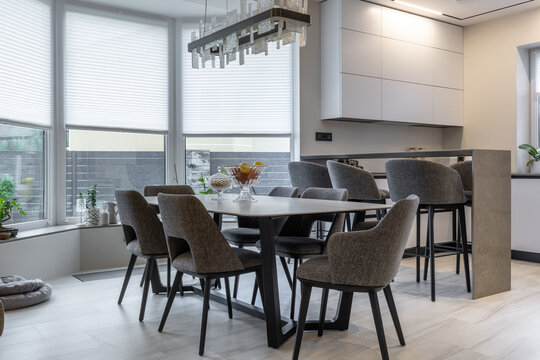 Modern open plan dining and kitchen area with stylish furniture