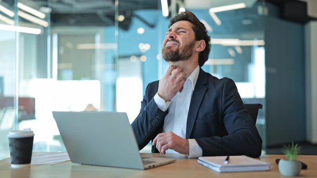 Working professional experiences sudden discomfort. Symptoms include arm, throat, and chest pain. Stress and health issues manifest in office environment, raising concerns about well-being.